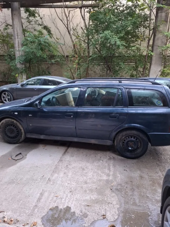 Usa stanga fata complet echipata Opel Astra G - imagine 1