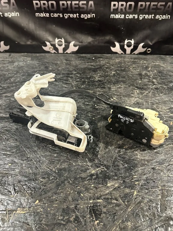 Incuietoare broasca stanga fata Volkswagen VW Passat B6 - imagine 1