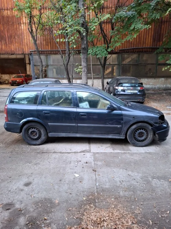 Planetara stanga Opel Astra G - imagine 4